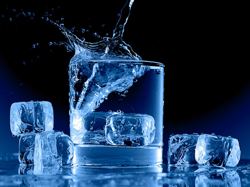 Icy-blue-cup-of-cold-water-ice-cubes-